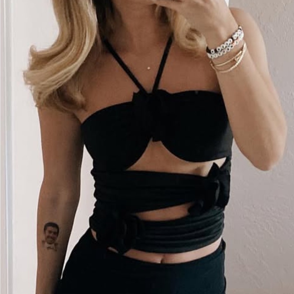 Black Women's cut out top with “flower” puffs